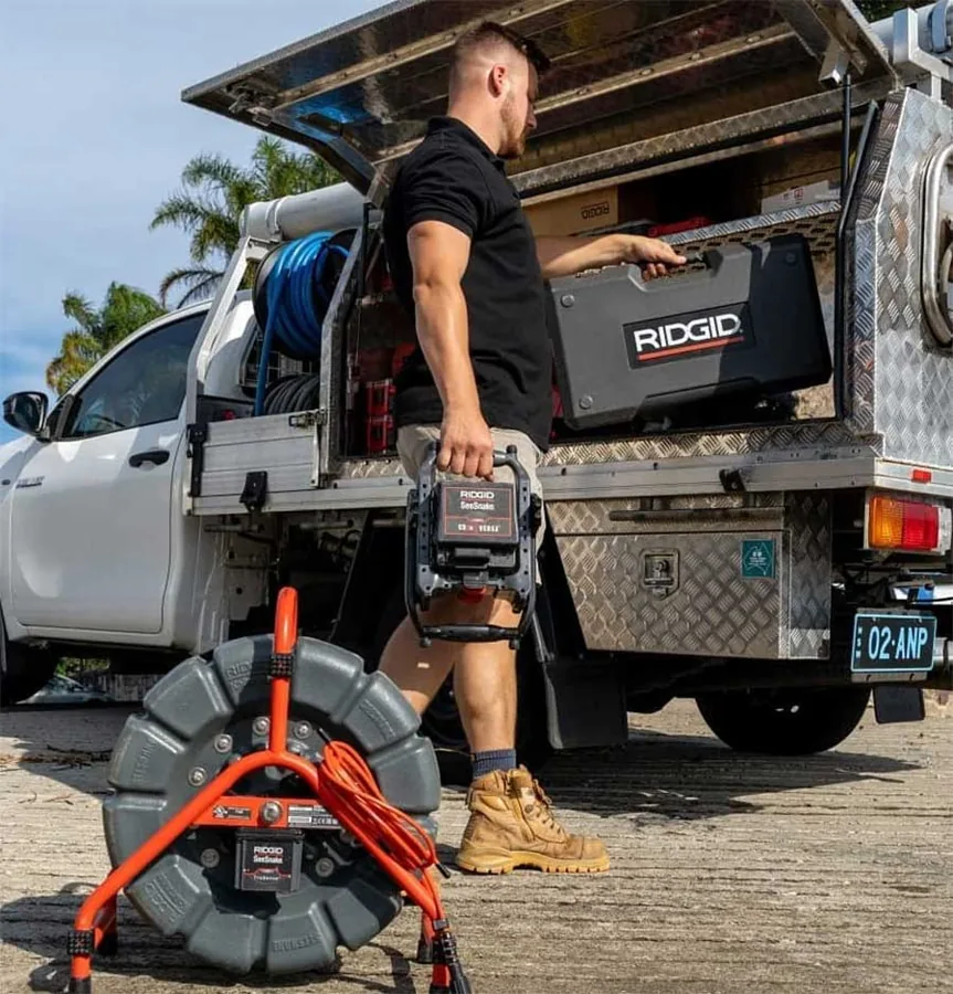 All Needs ute loaded with drain equipment